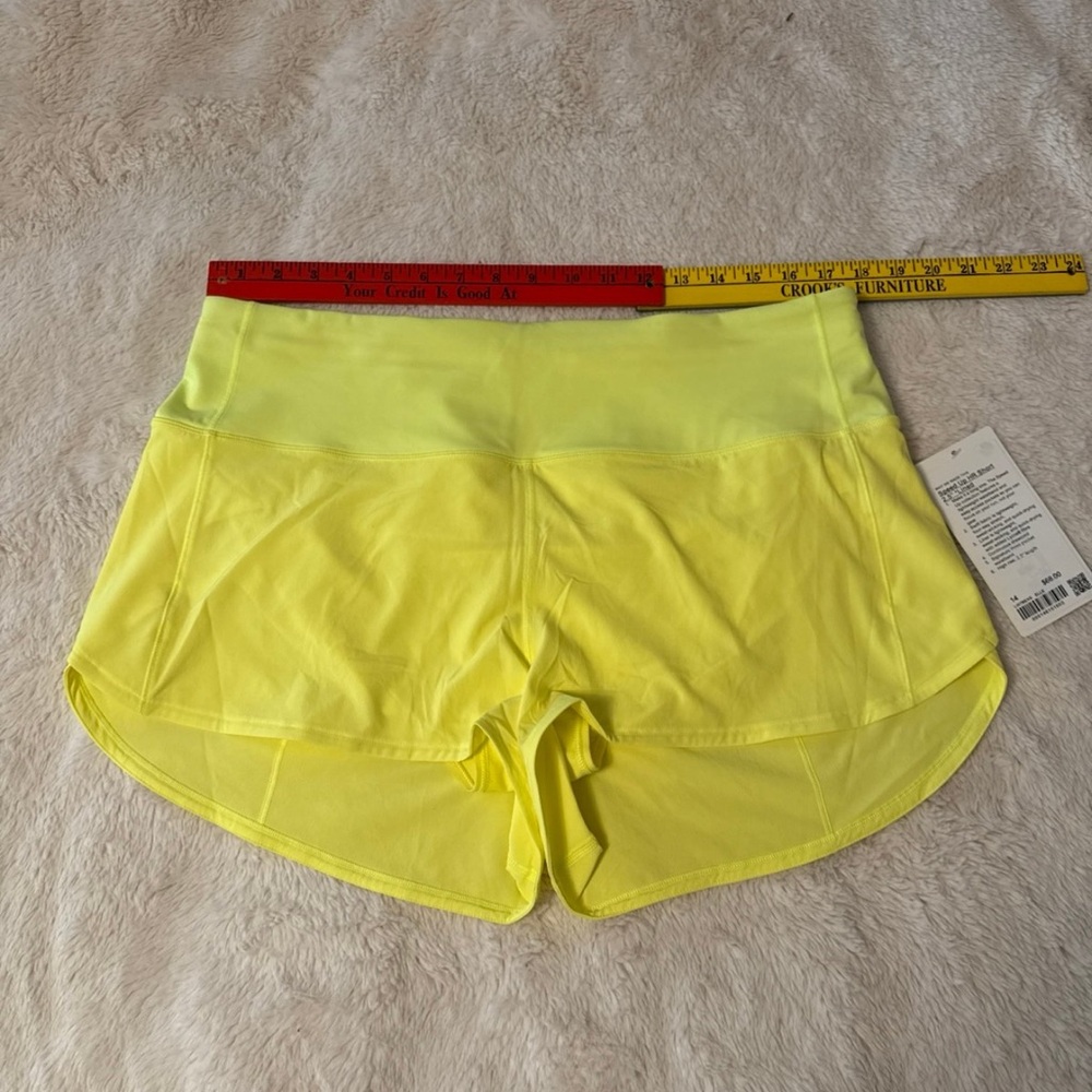 NWT Lululemon Speed Up High-Rise Lined Short 2.5"
Electric Lemon size 14 - Picture 5 of 7